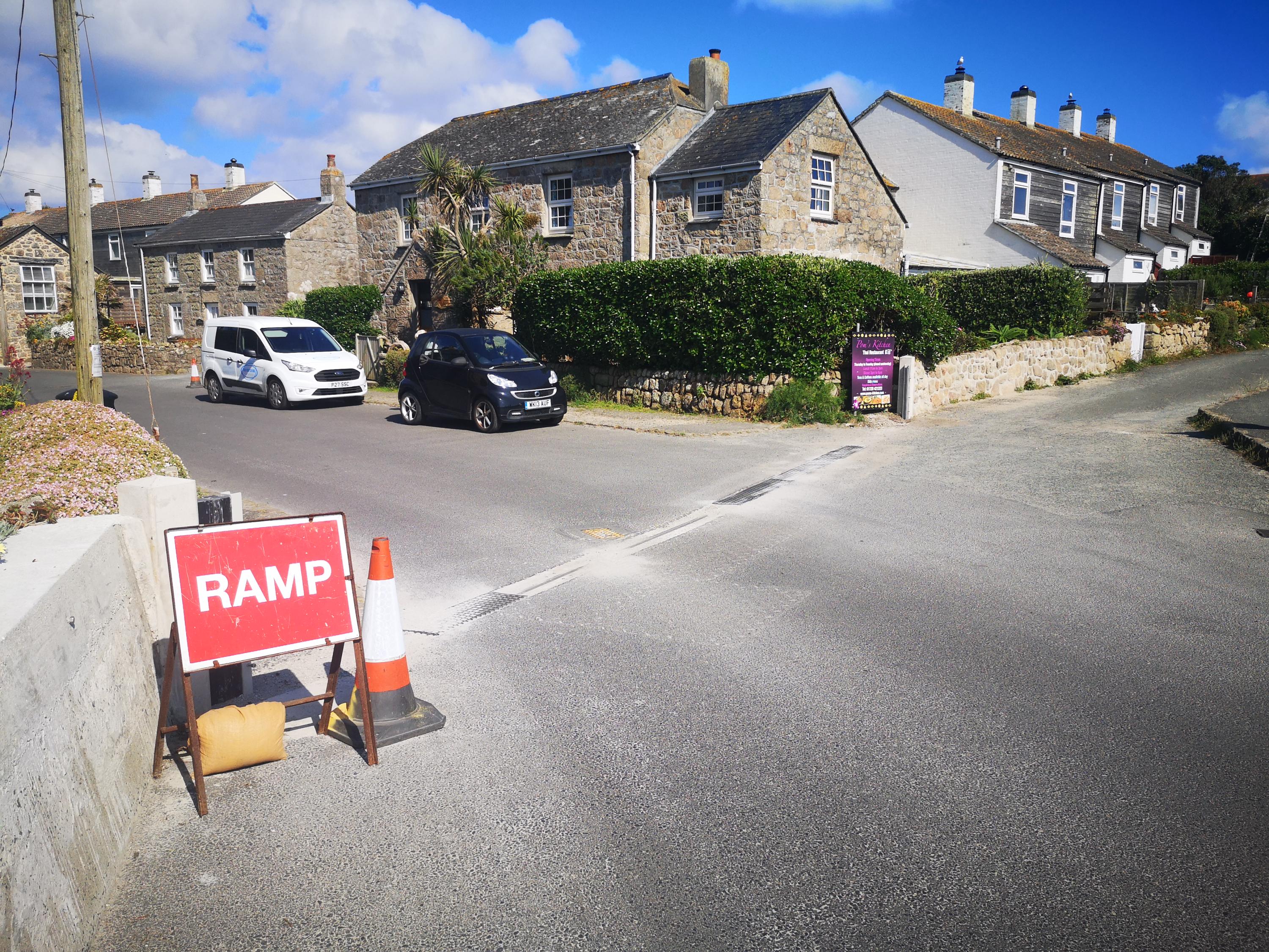 Image of the existing demountable sea defence infrastructure at the site of the planned works on Old Town Road on St Mary's