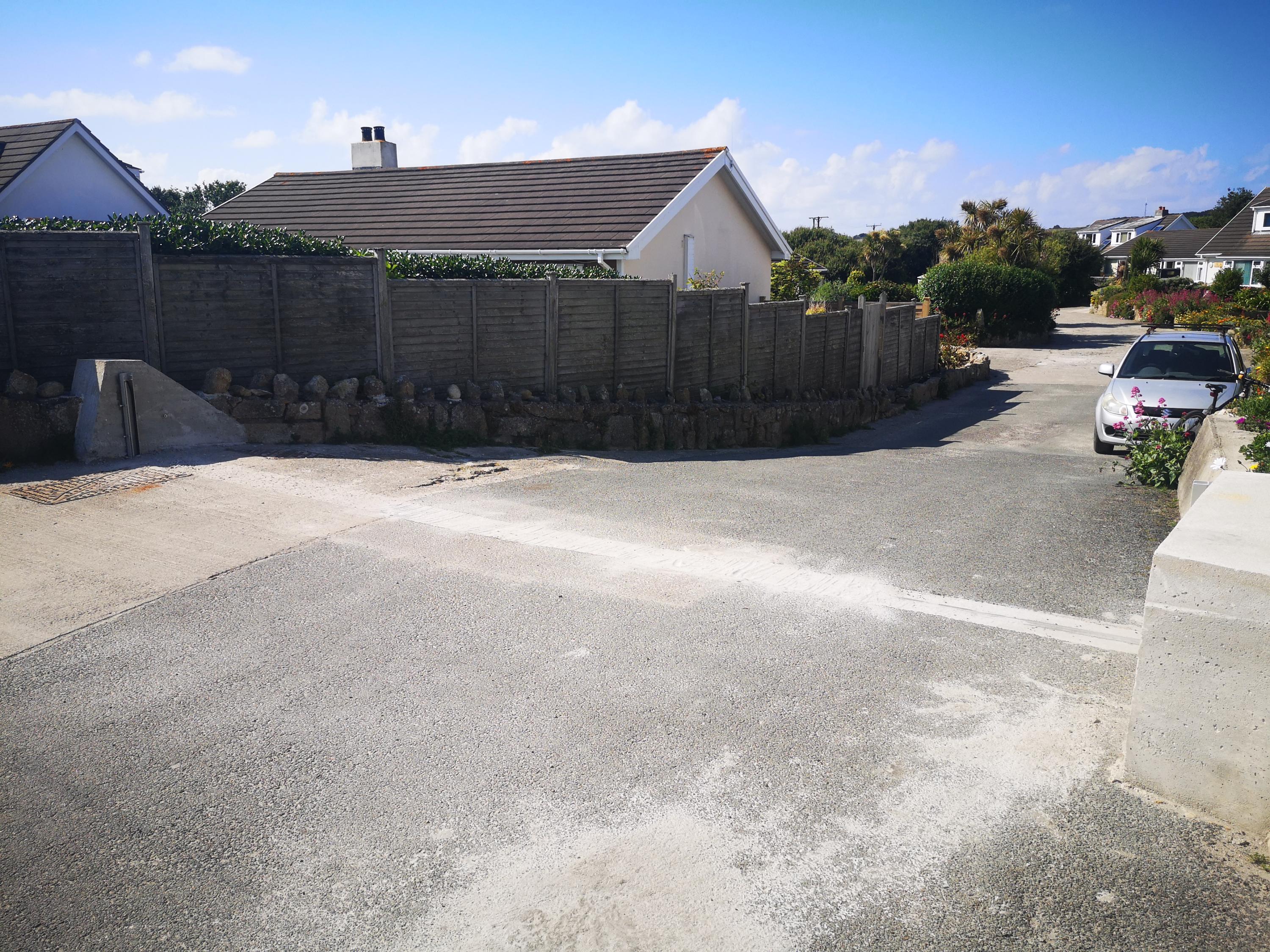 Image of the existing demountable sea defence infrastructure at the site of the planned works at the entrance to Trench Lane on St Mary's