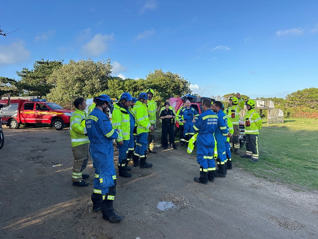 Image 1: Players from the attending agencies being briefed and tasked following the receipt of new information
