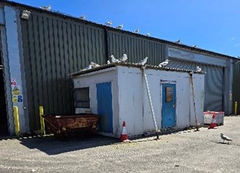 Image of an old site office which is for sale by sealed bid